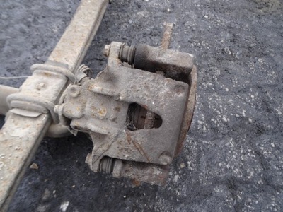 ZACISK LEWY TYŁ RENAULT MASTER I