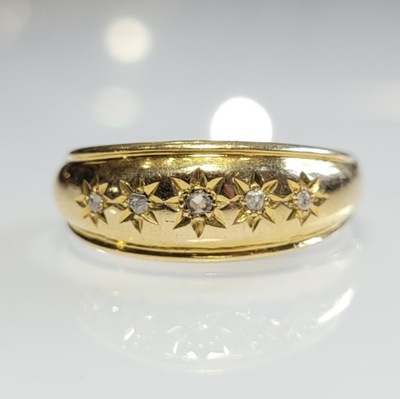 Złoty pierścionek, złota obrączka złoto 0,750 diamenty 0,02ct gwiazdki r.13