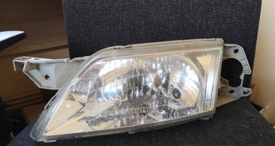 Фара лампа ліва mazda premacy i фото №1