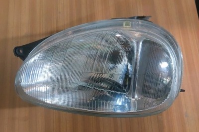 Opel corsa фара левый 555509-v фото №1