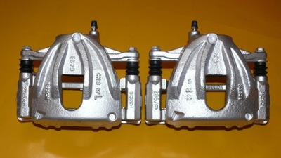 Супорти лівий правий перед toyota corolla ii 295/26 фото №1