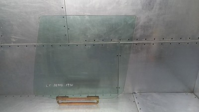 Скло ліва задня mazda demio 03r 1.5b фото №1