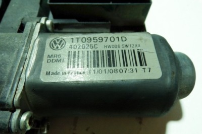 Моторчик скло передніх лівих двері vw фото №1