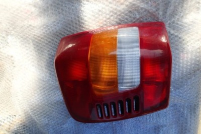 Jeep grand cherokee wj 99-04 лампа задняя левая фото №1