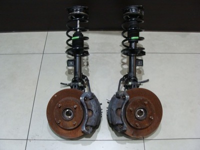 Амортизатор поворотный кулак левая nissan nv200 lift ! фото №1