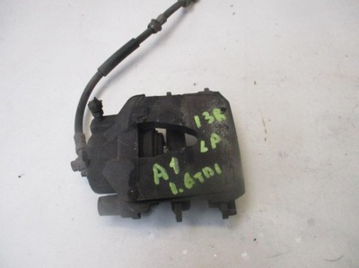 Супорт гальмівний лівий перед audi a1 1.6 tdi фото №1