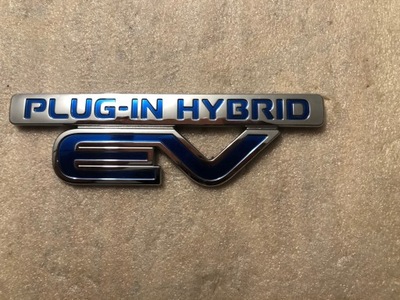 INSIGNIA EMBLEMA PHEV MITSUBISHI OUTLANDER 3 7415A455 ORIGINAL UZYWANA  