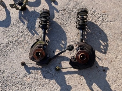 Bmw x1 e84 поворотний кулак амортизатор mcperson перед фото №1