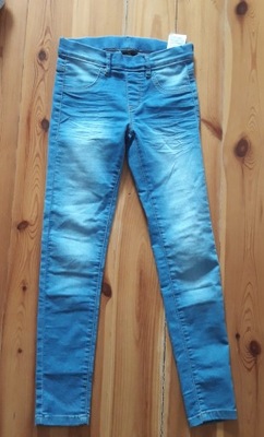 jasnoniebieskie jeansy joggersy rurki 146 cm
