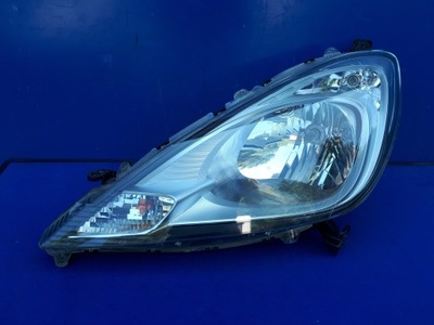 Honda jazz lift 2011- 11-14 фара лампа ліва фото №1