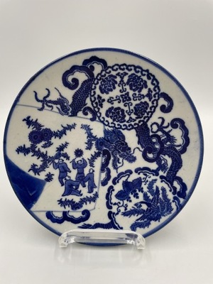 Porcelanowy talerz w kolorze niebiesko-białym XIX wiek. Smok i Feniks