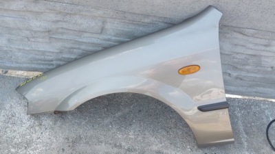 Mazda 323f b3 12m крила передній лівий фото №1