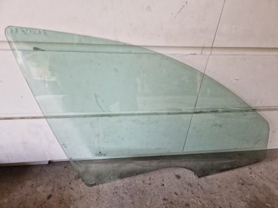 Скло двері правий перед skoda octavia ii lift 1.6 tdi фото №1