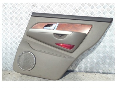 Ssangyong rexton 2003r - обшивка двері правий задня фото №1