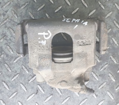 Супорт гальмівний правий перед kia sephia i 1.5 фото №1