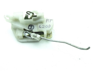 Mitsubishi l200 ii / iii 96-06 замок двері правий задня фото №1