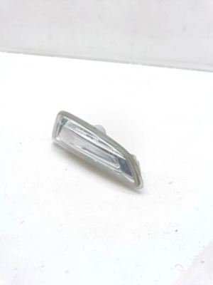 Opel astra j 2010 поворотник крила передній фото №1