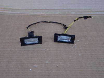 Audi a4 b8 лампа освітлення номерного знака 8t0943021 фото №1