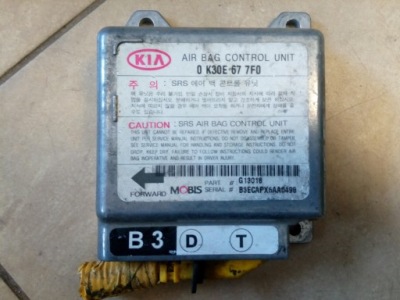 Модуль подушки безпеки повітряної модуль подушка безпеки kia rio 0k30e677f0 oryg. фото №1