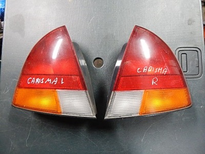Лампа задняя mitsubishi carisma hb 95-00 l/r фото №1