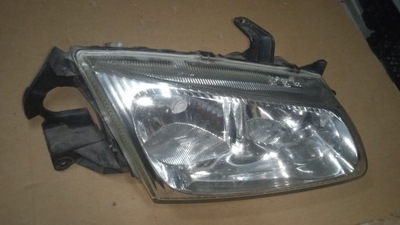 Фара правий лампа перед eu nissan almera n16 фото №1