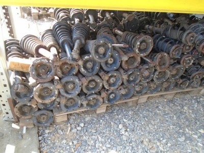 Nissan primera p11 амортизатор задній задня фото №1