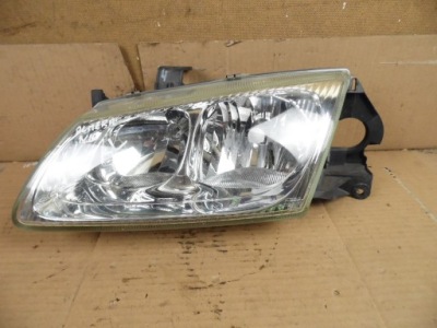 Nissan almera n16 лампа передняя левая фото №1