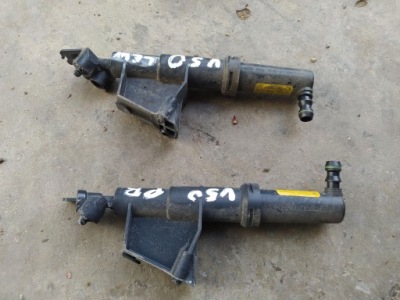 Омивач лампи фара лівий перед 1308600043 volvo v50 2007 volvo фото №1