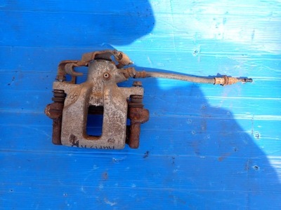 Toyota auris 06-12 супорт задній правий фото №1