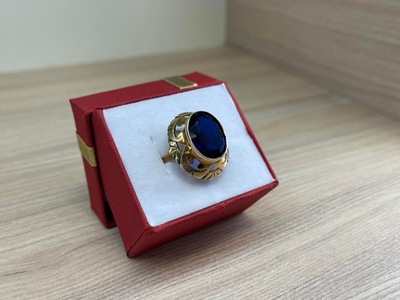 Złoty pierścionek 585 z niebieskim kamieniem | 6,62g | roz. 15