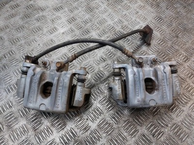 Супорт гальмівний лівий задня + правий задня santa fe iii фото №1