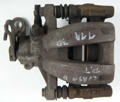 Opel corsa d 11 r супорт правий задня фото №1