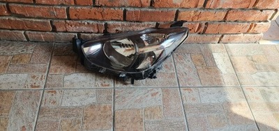 Mazda 2 лампа лівий перед передня фото №1