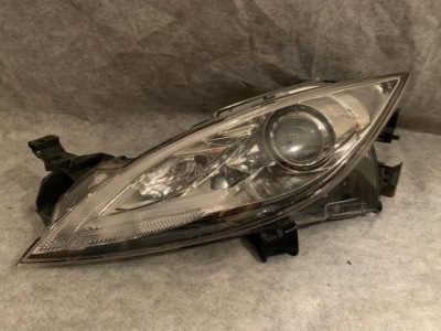Mazda 6 lift ксенон ліва лампа поворотна фото №1
