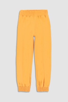 Dziewczęce spodnie dresowe żółte 152 Mokida
