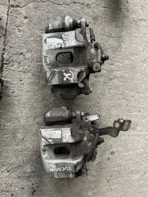 Hyundai tucson ii суппорт тормозной перед левый правый фото №1