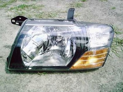 Фара лівий mitsubishi pajero rok 2001-2004 фото №1