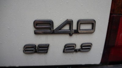 EMBLEMA INSCRIPCIÓN AL TAPA DE MALETERO PARTE TRASERA VOLVO 940 SE 2.3  