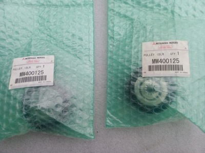 Mitsubishi ролик ремінь mw400125 новий фото №1