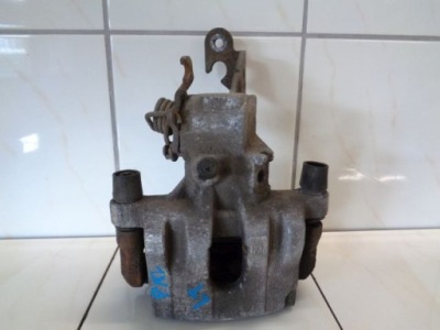 Primera p12 02 1.8 b супорт гальмівний лівий задня фото №1