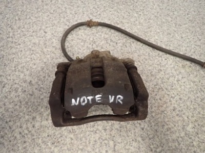 Nissan note e11 супорт гальмівний перед правий фото №1