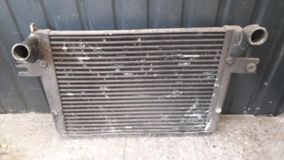 52079970aa интеркулер jeep cherokee wj 2.7 фото №1