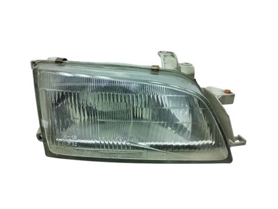 Toyota carina e лампа правая перед sedan фото №1