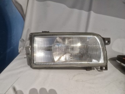 Nissan terrano ii лампа фара перед фото №1