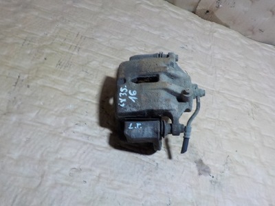 Hyundai ix35 супорт гальмівний лівий перед фото №1