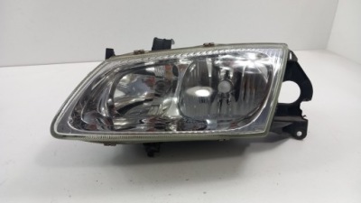 Nissan almera n16 лампа перед левая фото №1