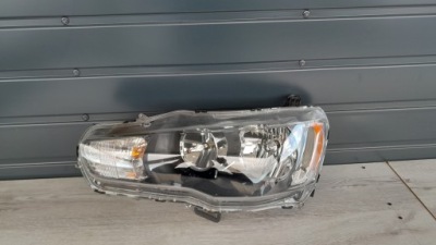 Mitsubishi lancer viii ліва лампа перед передня звичайна фото №1