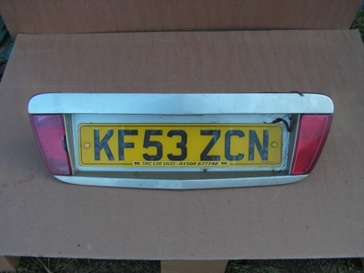 Молдинг кришки pod номерний знак nissan primera фото №1