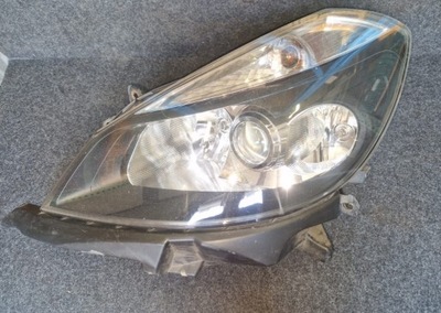 Renault clio iii лампа левая перед линза 7701061074 фото №1