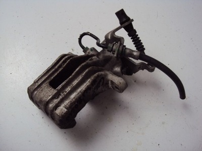 Супорт гальмівний правий задня vw golf vi scirocco фото №1